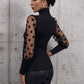 Women's Buttoned Lantern Sleeve Turtle Neck Blouse